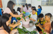 肖家镇汪家联校：“粽”情童年 “粽”享劳动
